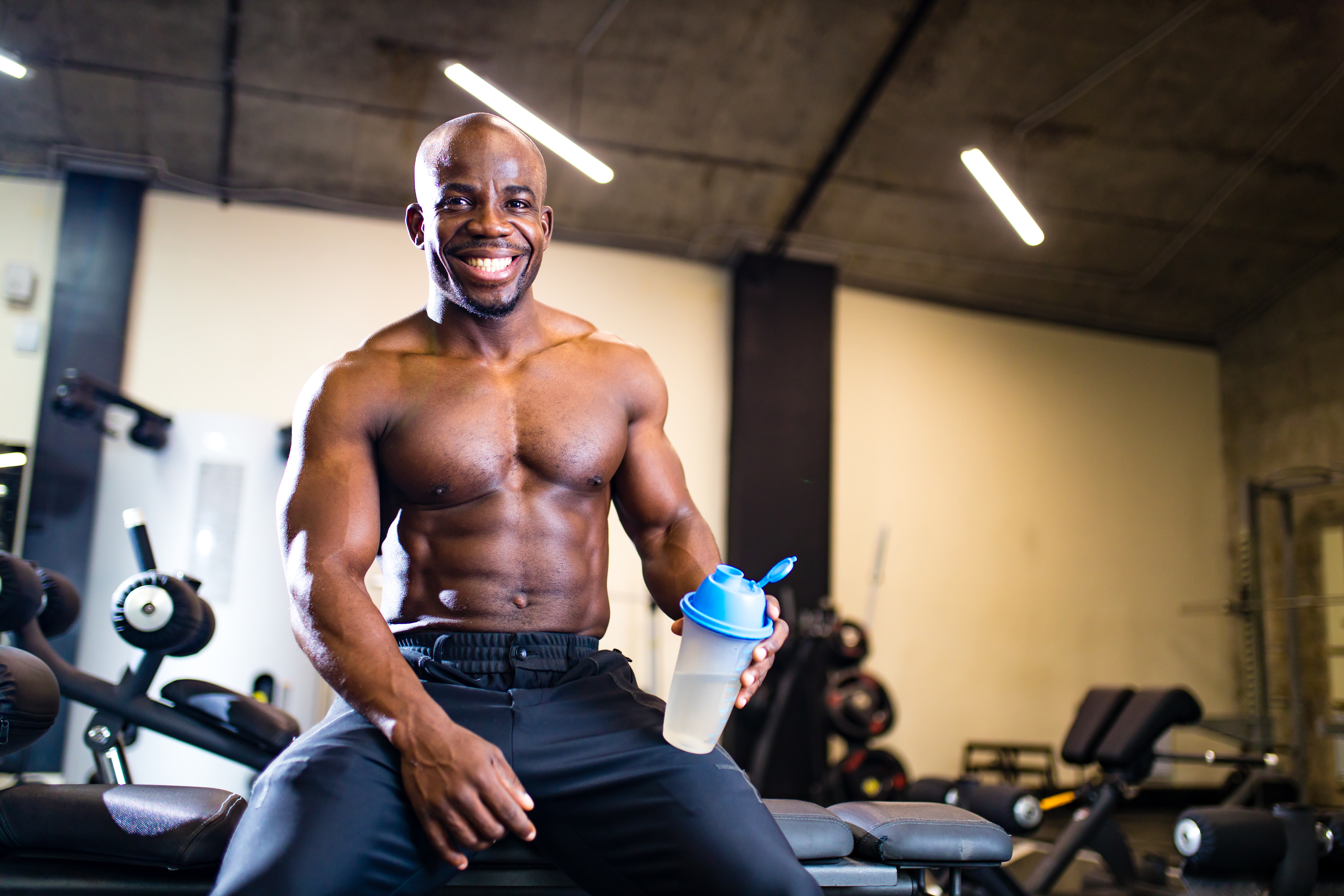 attractive african hispanic athlete esting after training and drinking protein attractive african hispanic athlete esting after training and drinking protein .